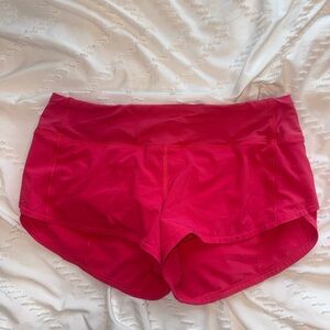 Hot pink Lululemon shorts (size 6 2 inch)